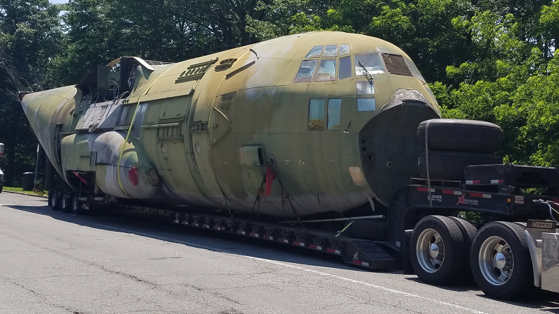 Illustration for article titled I Guess This Is How You Fit A C-130 In A Parking Lot